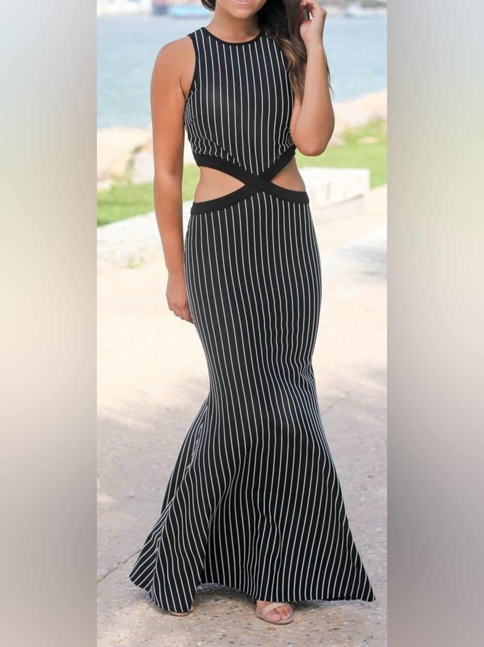 the clothing company Black and White Striped Cutout Maxi Dress